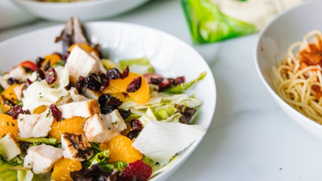sliced fruit on white ceramic bowl