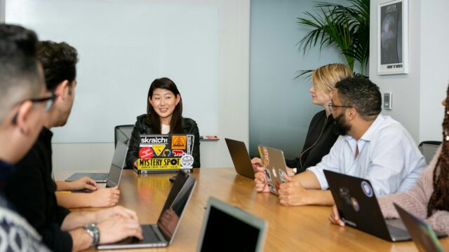 people in a meeting discussing app development